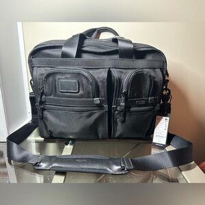 Tumi black travel laptop bag